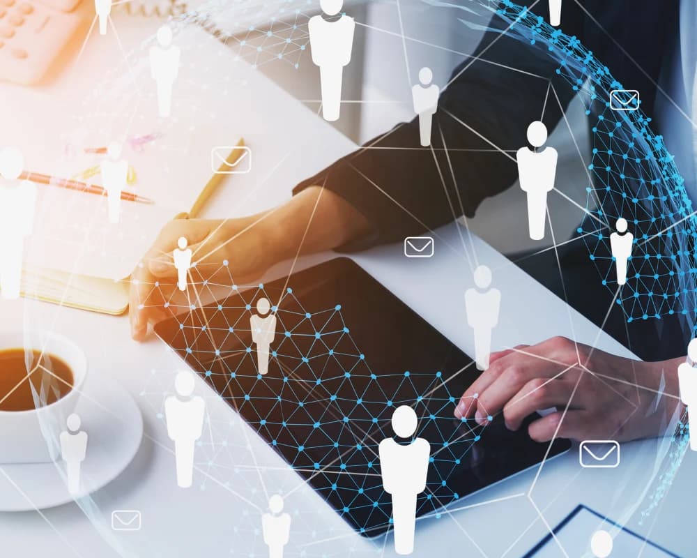 HR professional using a digital network for employee and HR self-service portals.