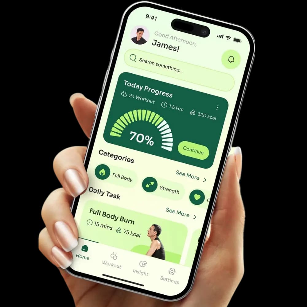 Hand holding a smartphone showing a mobile dashboard interface, representing responsive web portal development for user-friendly business platforms.